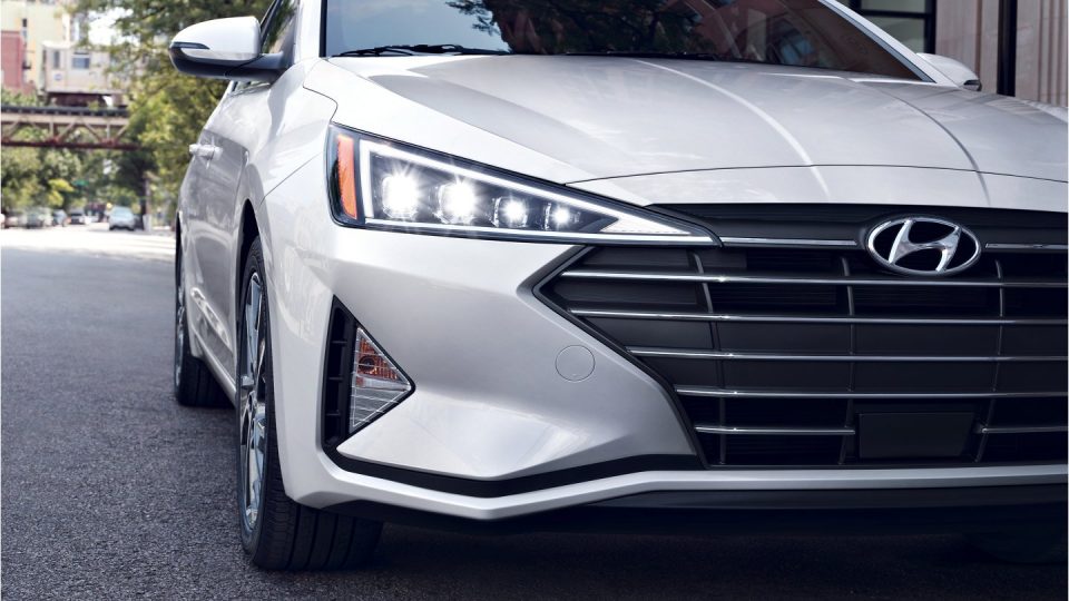 Front grille of a white Hyundai Elantra