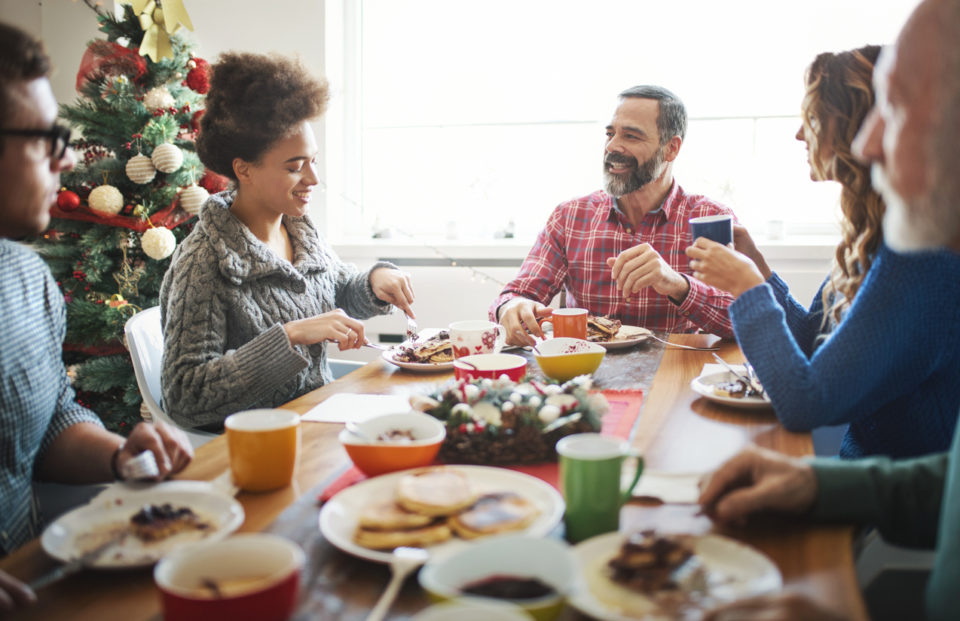 Family having breakfast on Christmas morning.