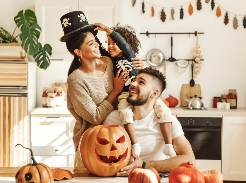 family having Halloween fun at home