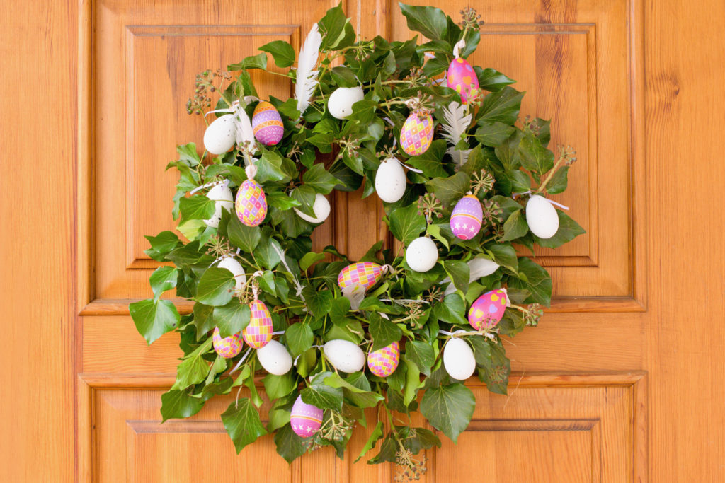 Natural green Easter ivy wreath on the door